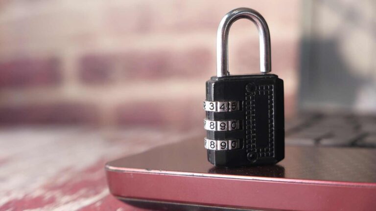 Padlock on laptop symbolizing data security risks in the Indonesia 19% Trade Deal with the United States.