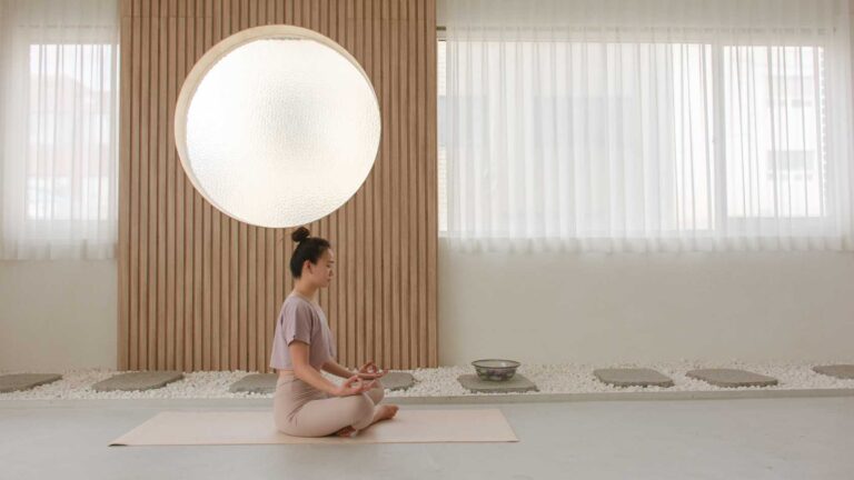 a woman doing yoga symbolizing Indonesia wellness tourism